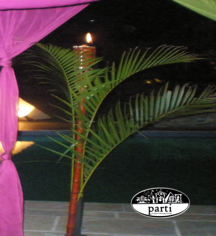 Tiki Torch and Palm Frond Cluster Stage Props by PARTI - Australia's Premier Prop Hire and Event Decorating Service