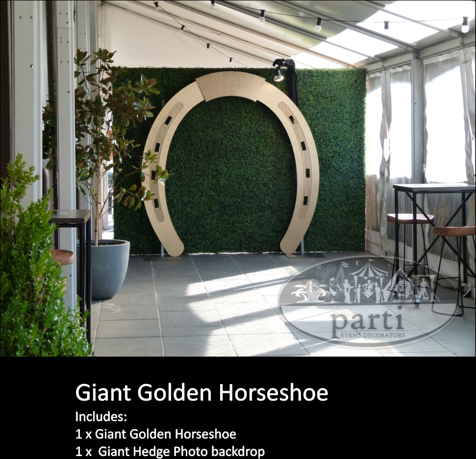 Giant Golden Horseshoe Stage Prop by Parti Theme Events